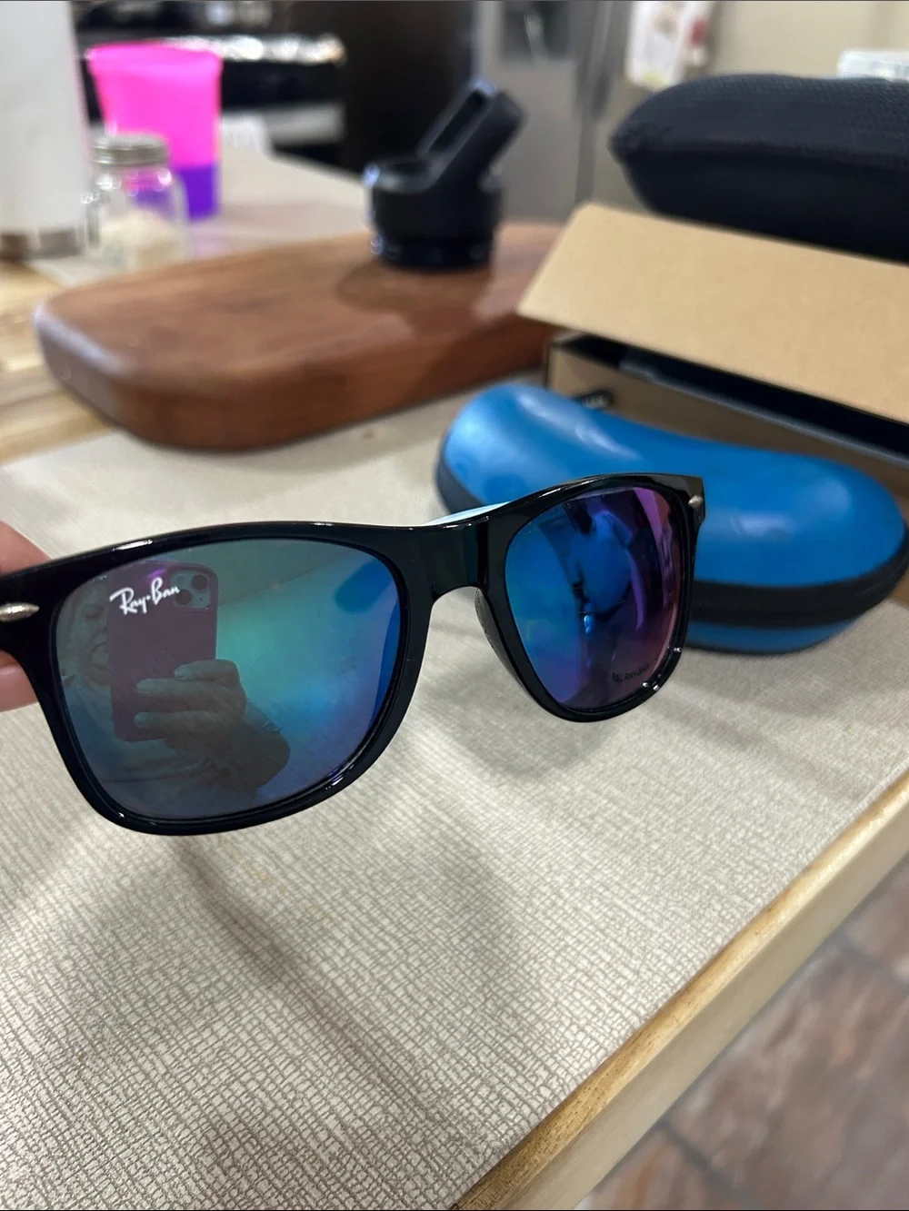 Ray-Ban Black Frame Sunglasses with Blue-Purple Mirrored Lenses